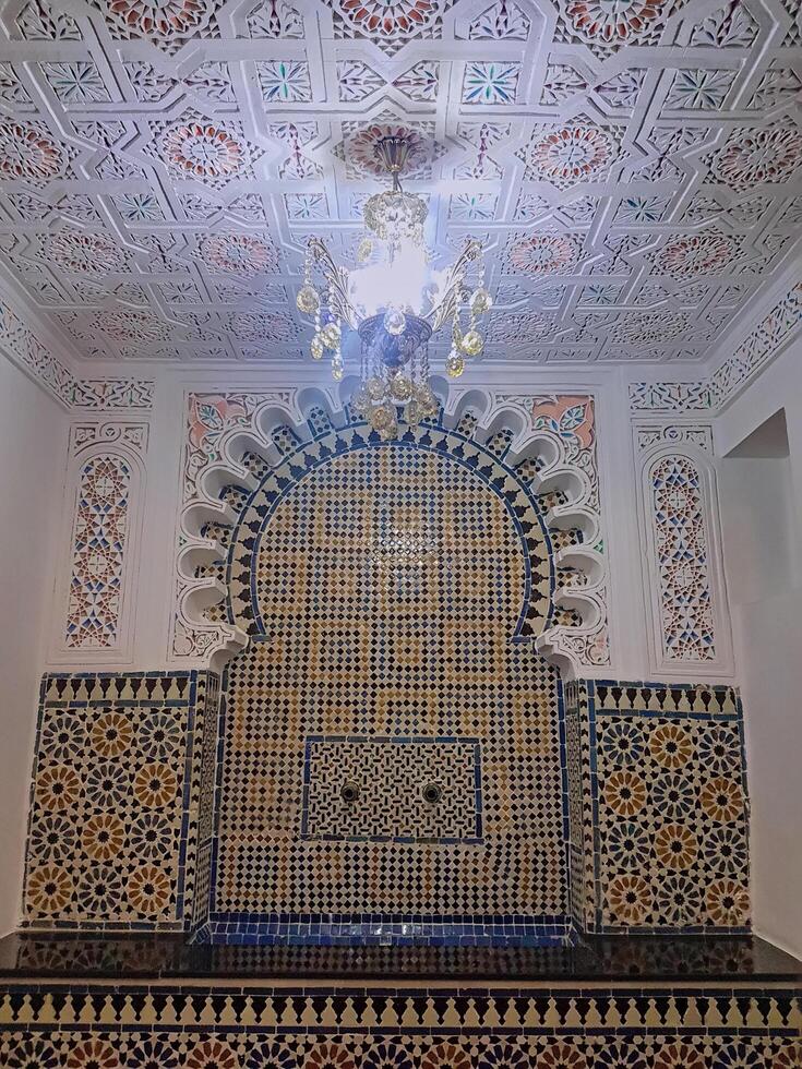 Moroccan Zellige is not just a decorative element, it is a stunning example of traditional tilework with intricate geometric patterns and intricate motifs that reflect Morocco's rich artistic heritage photo