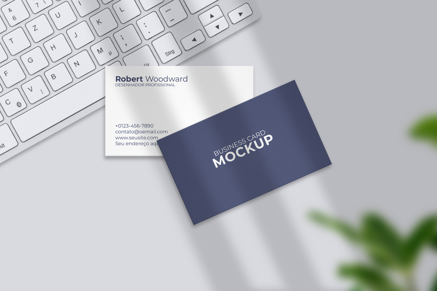 business card mockup on a white keyboard psd