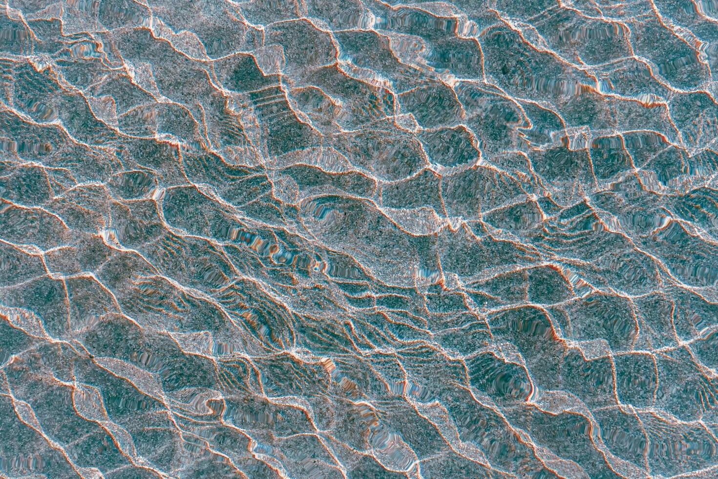 refelction an ripples on the water in the pool, color background photo