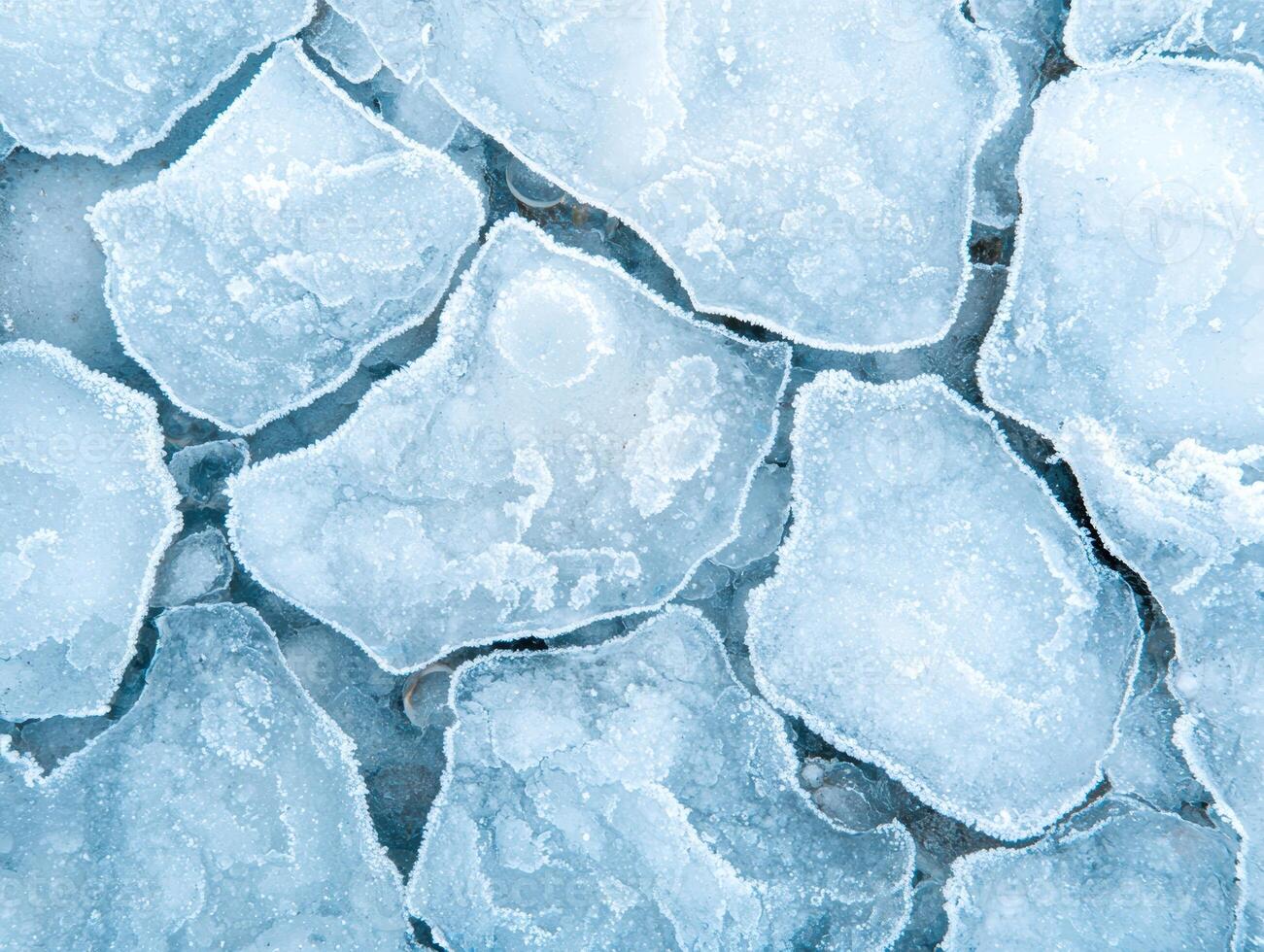 Intricate patterns of frozen ice photo