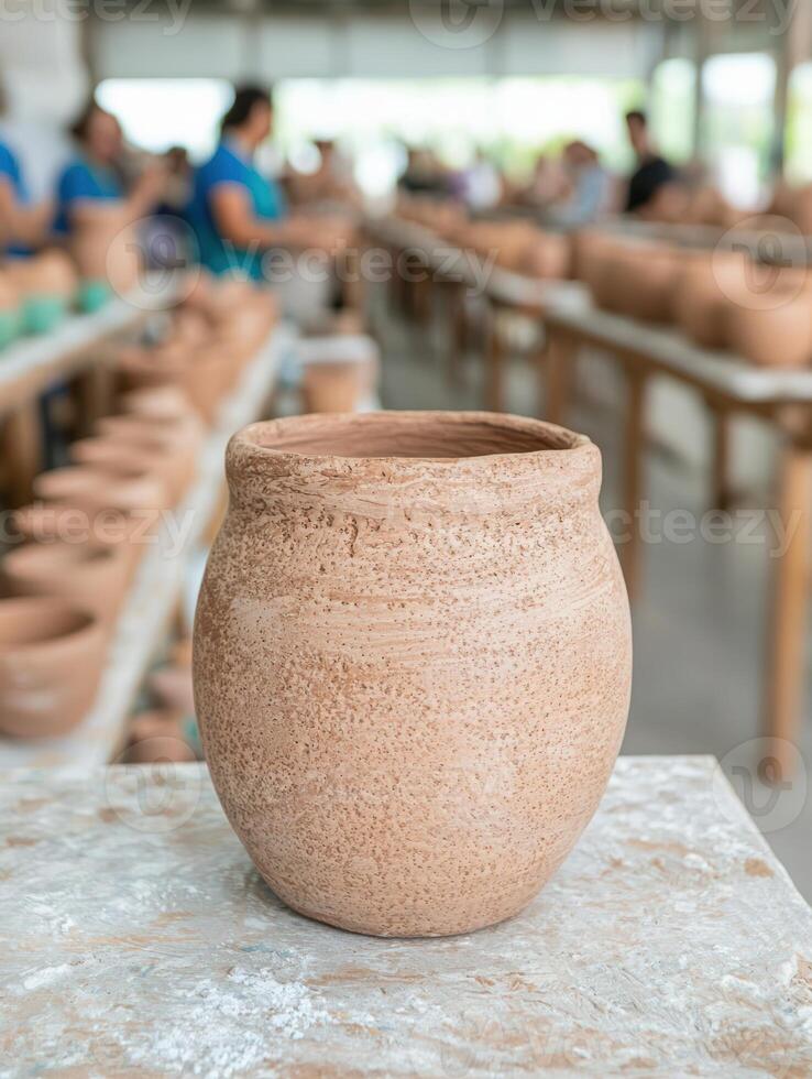 Handmade pottery on display in a workshop photo