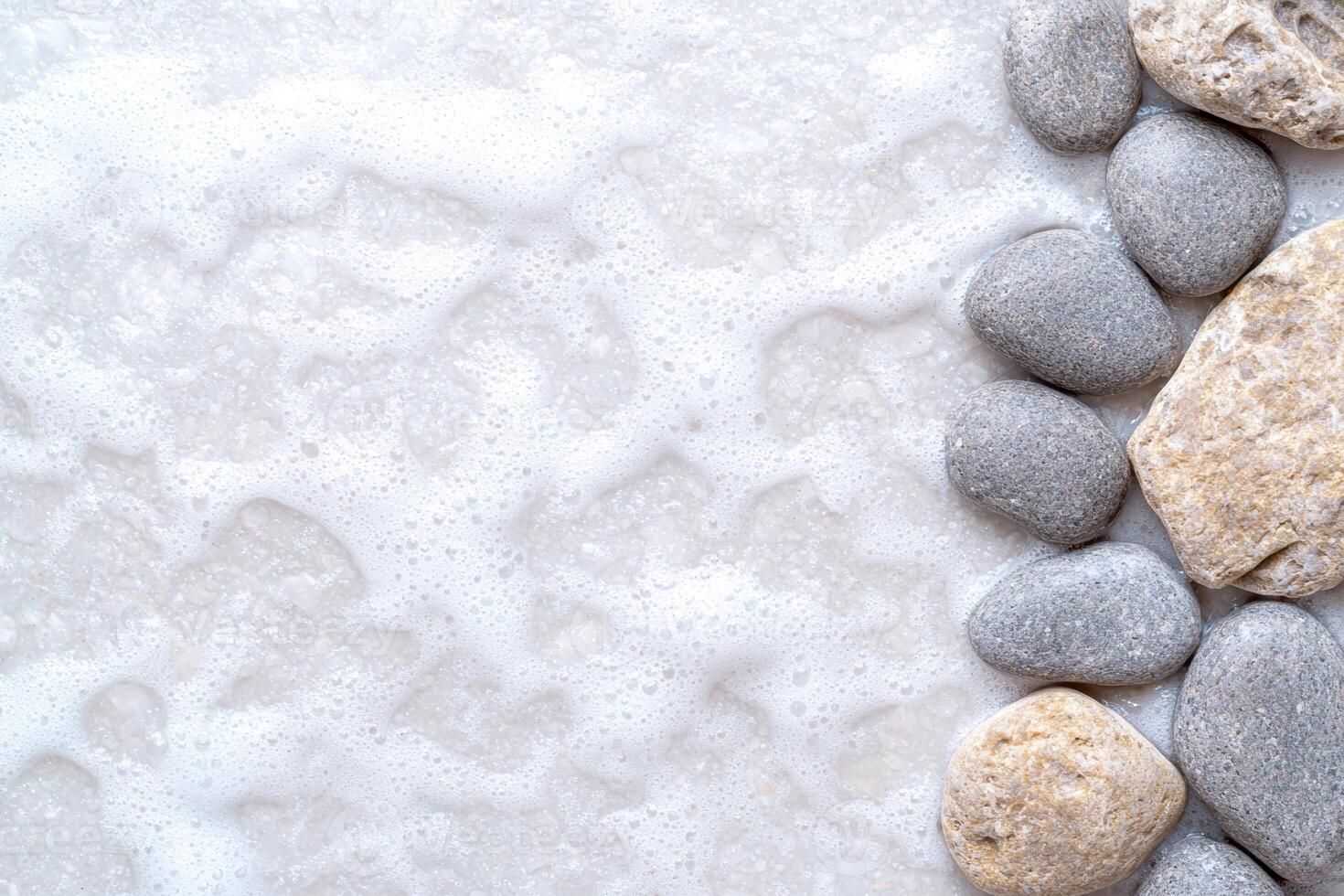 Peaceful zen stones on white background photo