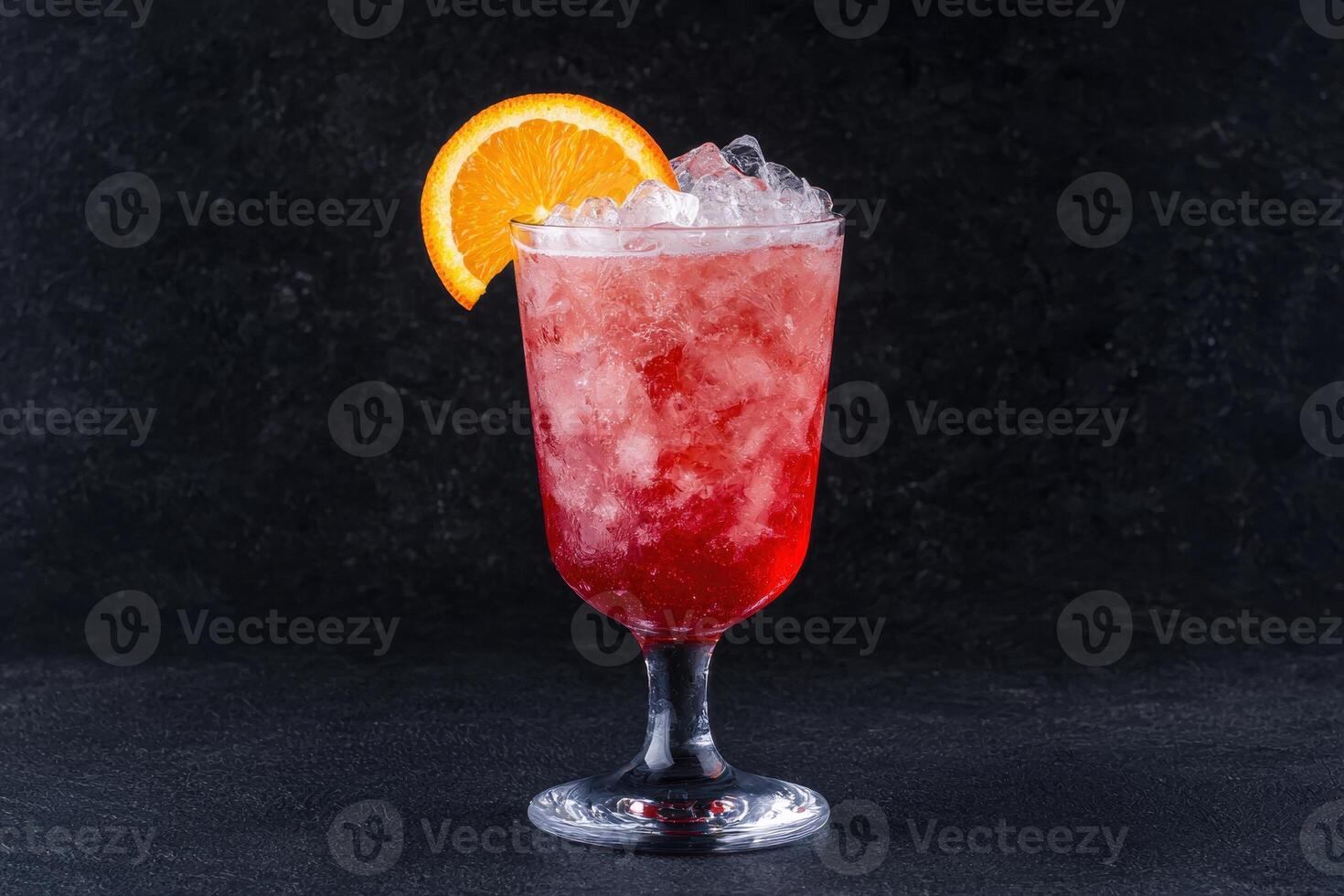 Refreshing red cocktail with orange slice garnish photo