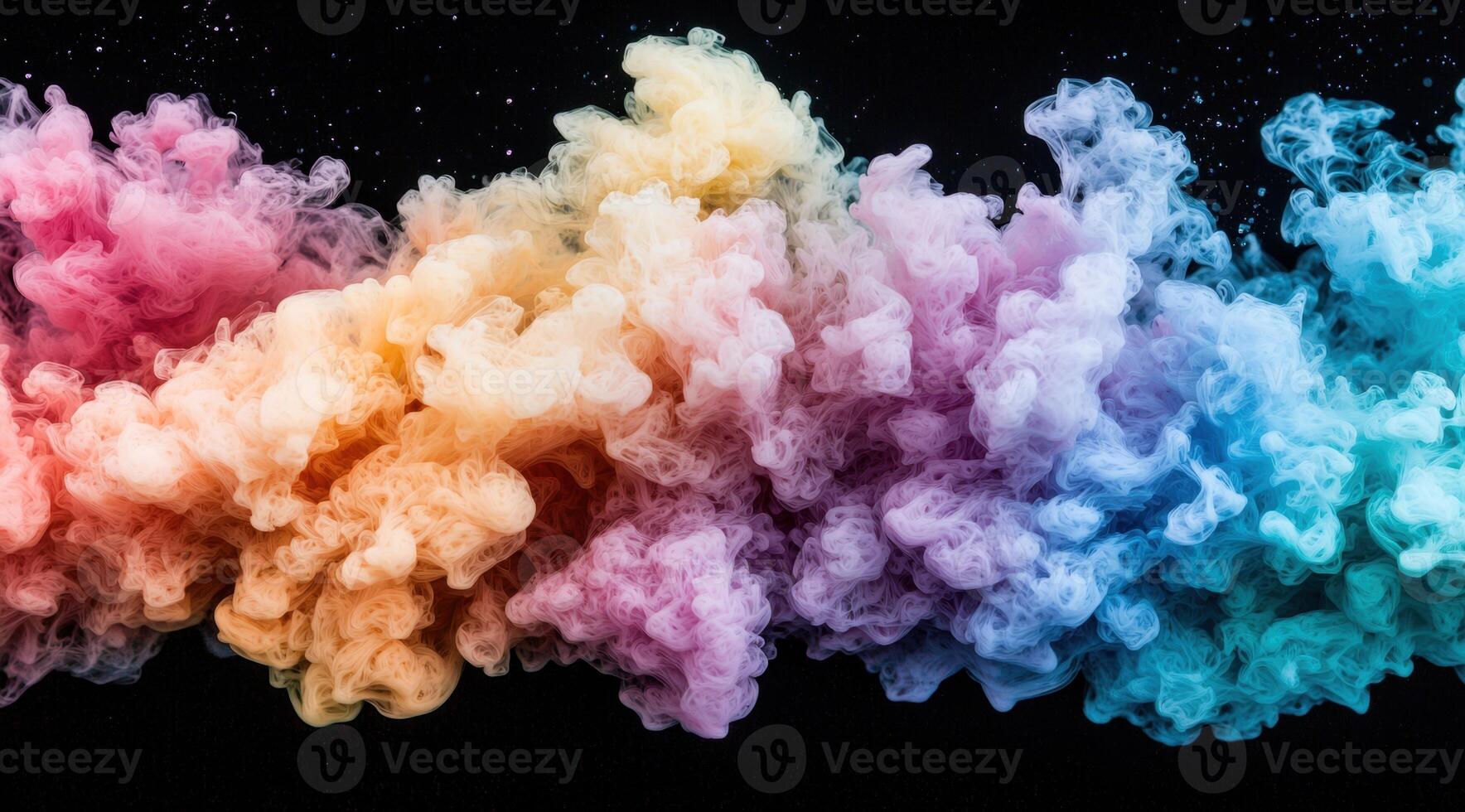 Colorful smoke explosion against black background photo