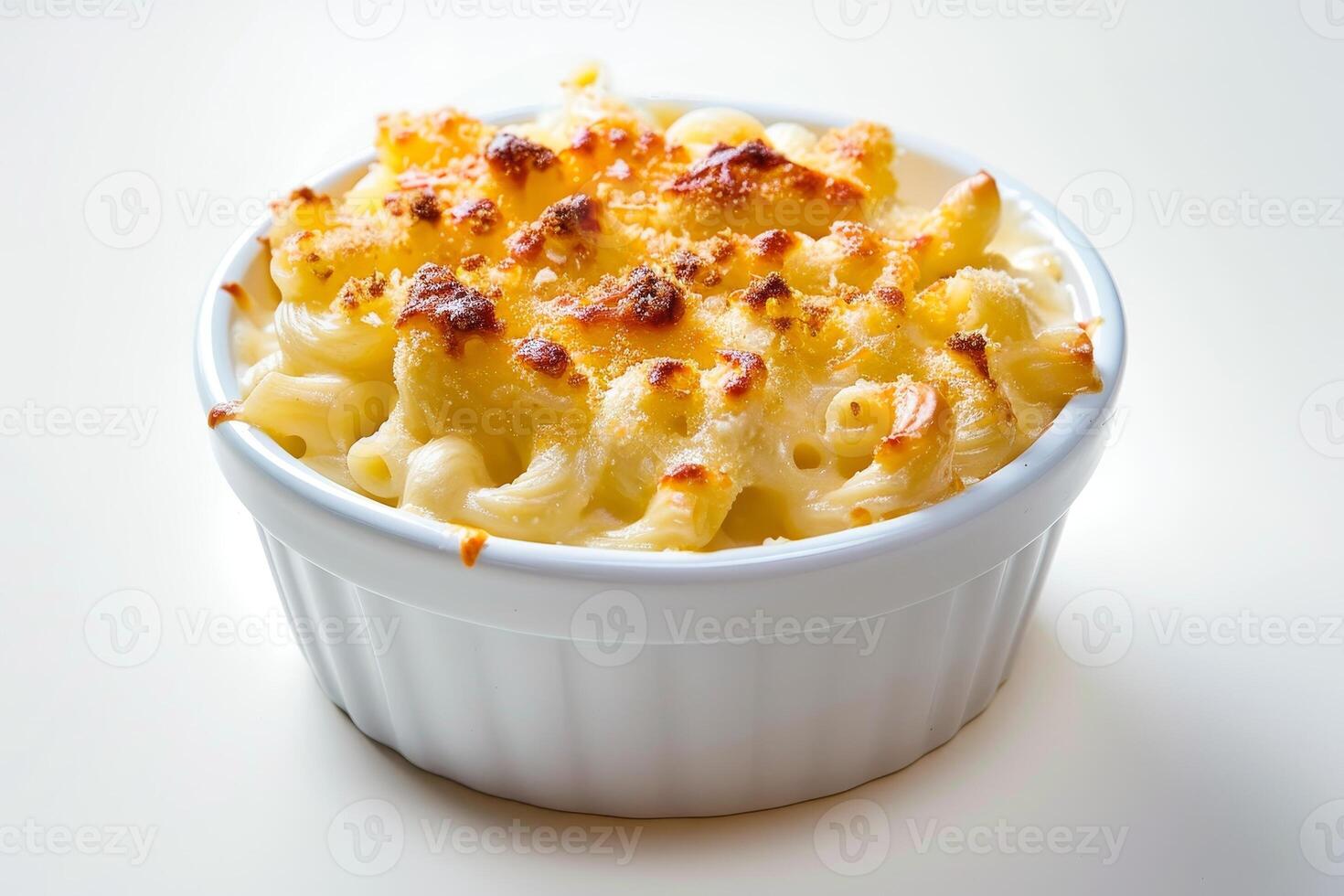 Delicious baked mac and cheese in a white bowl photo