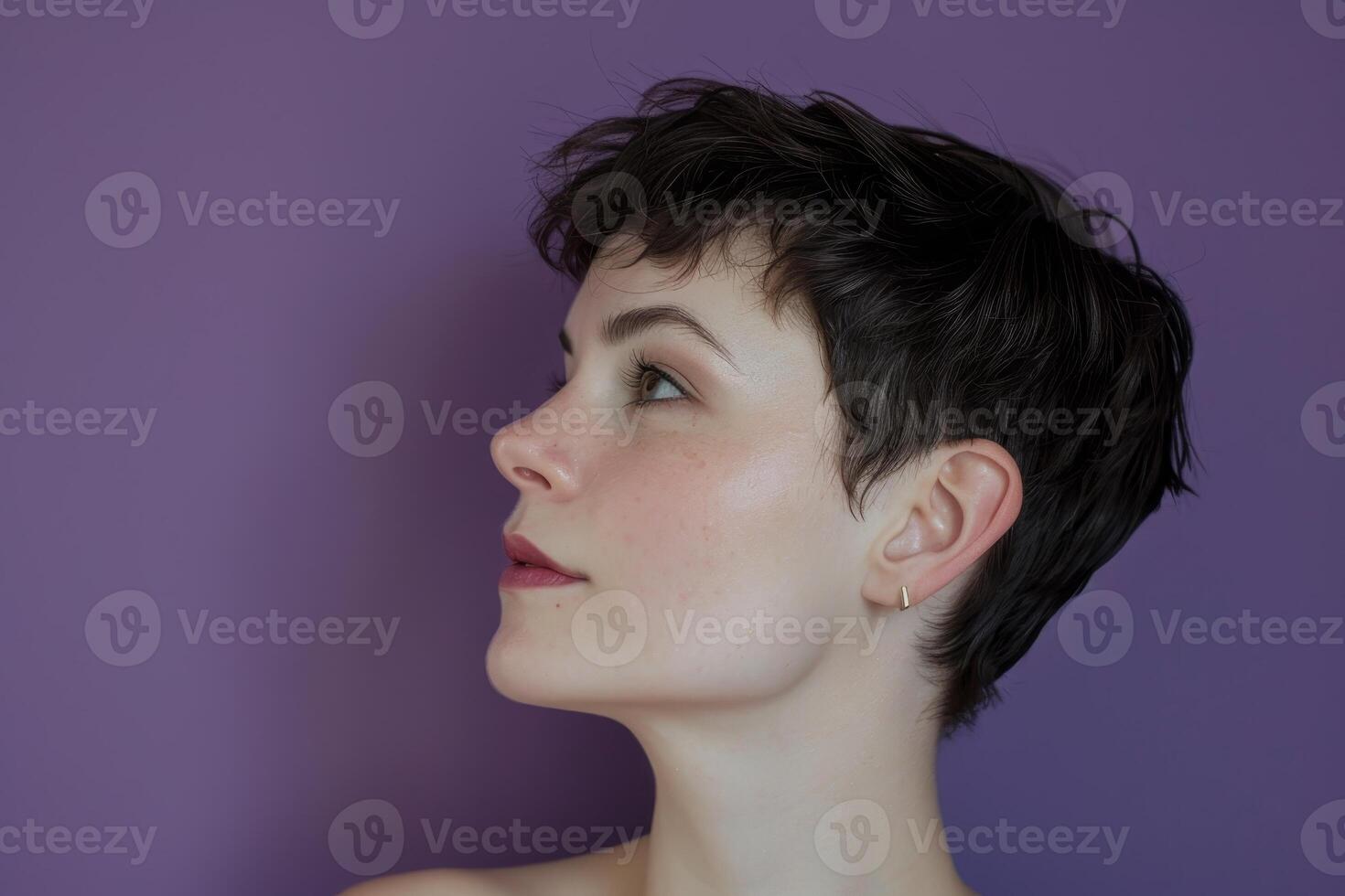 profile shot of a woman with short dark hair photo