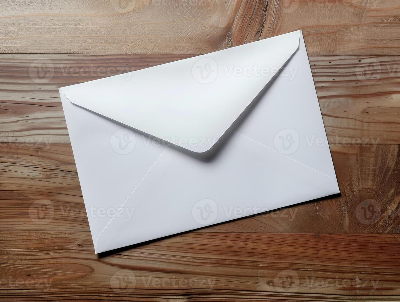white envelope on wooden background photo