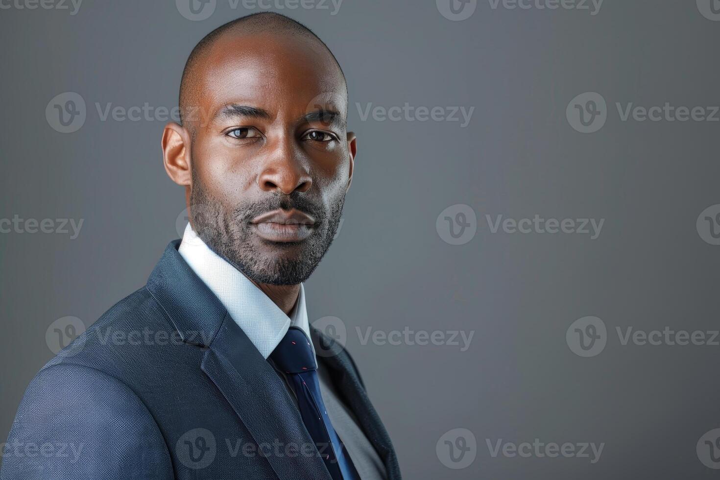 Serious businessman with thoughtful expression photo
