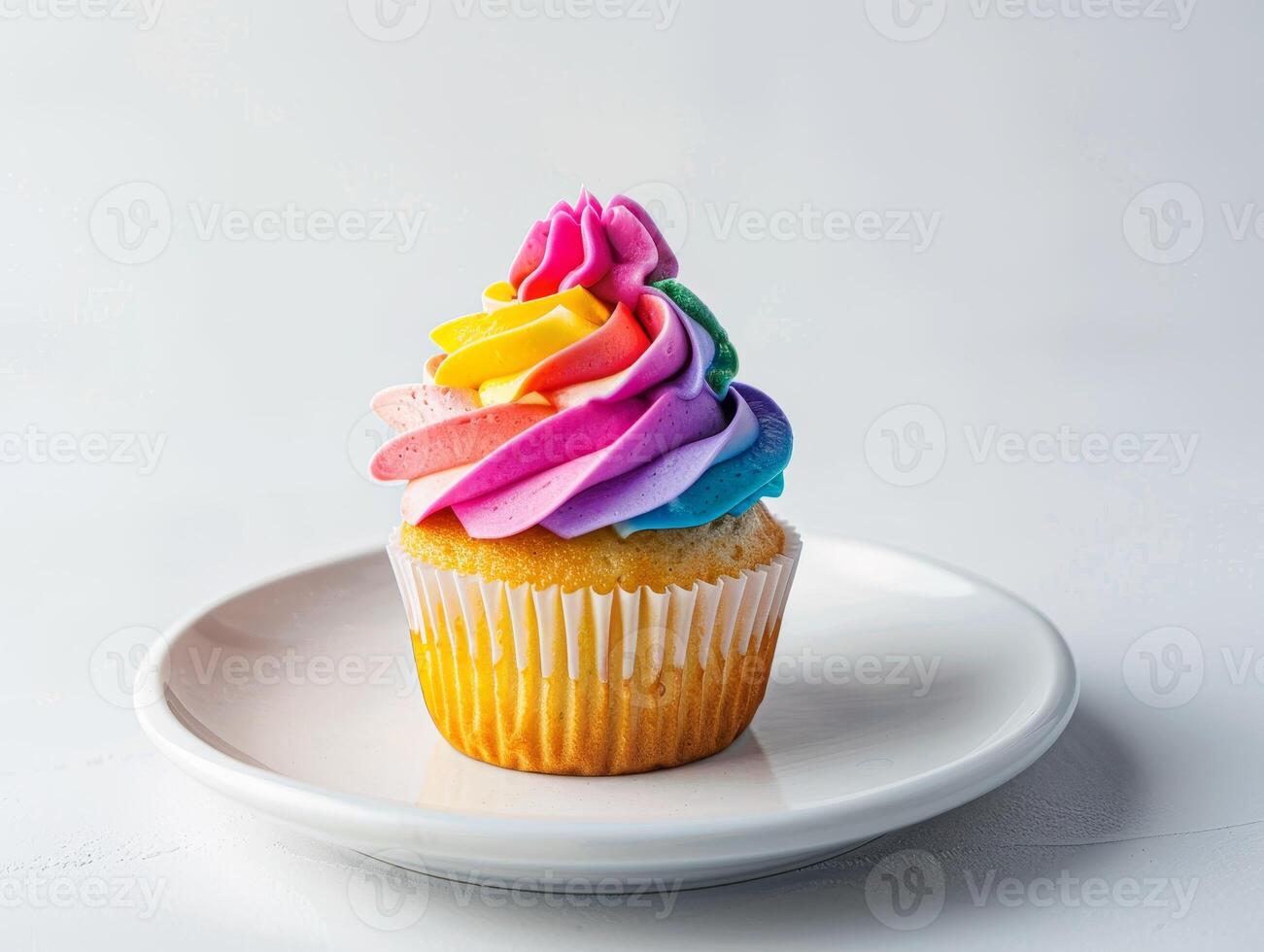 colorful cupcake with rainbow frosting photo