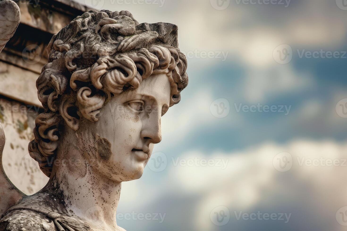 Closeup of a classical statue with intricate facial features photo