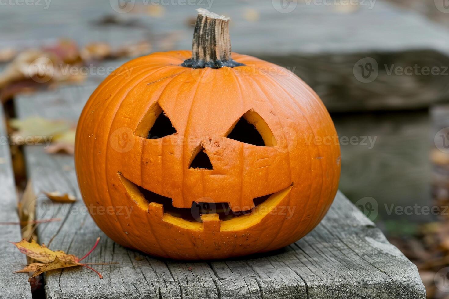 Carved Halloween pumpkin jack o lantern photo