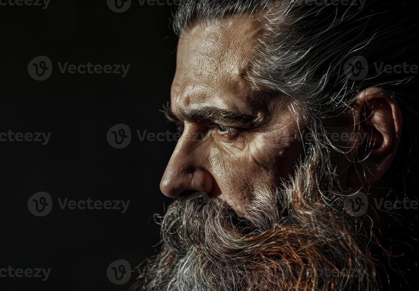Rugged Bearded Man in Dramatic Lighting photo