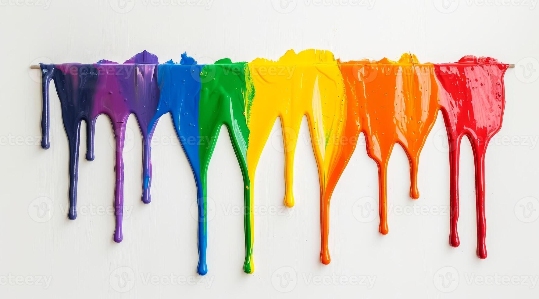 Vibrant rainbow paint drips photo