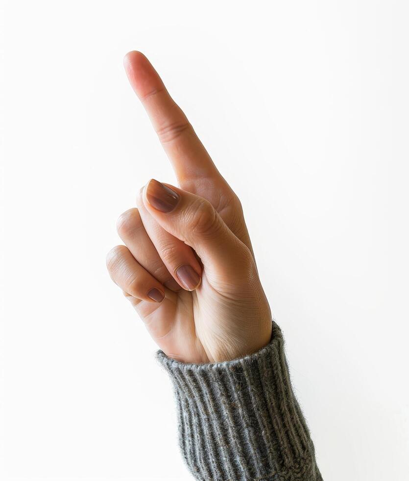 Pointing finger gesture on white background photo
