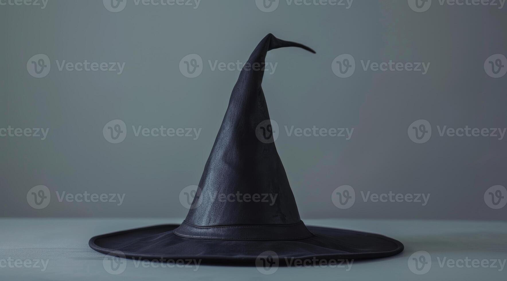 Mysterious Black Witch Hat on a Moody Background photo