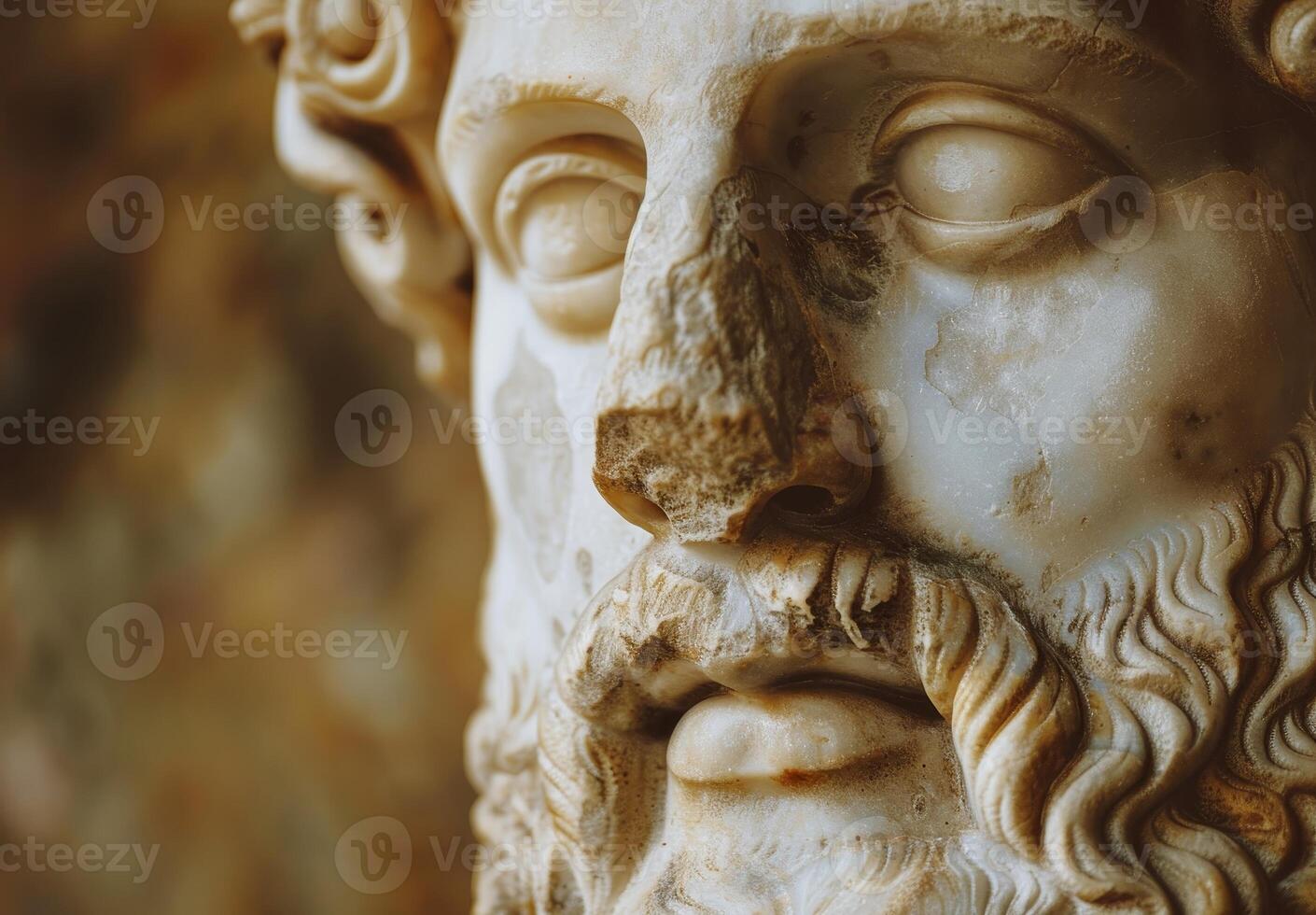 Close up of an ancient sculpted face with intricate details photo