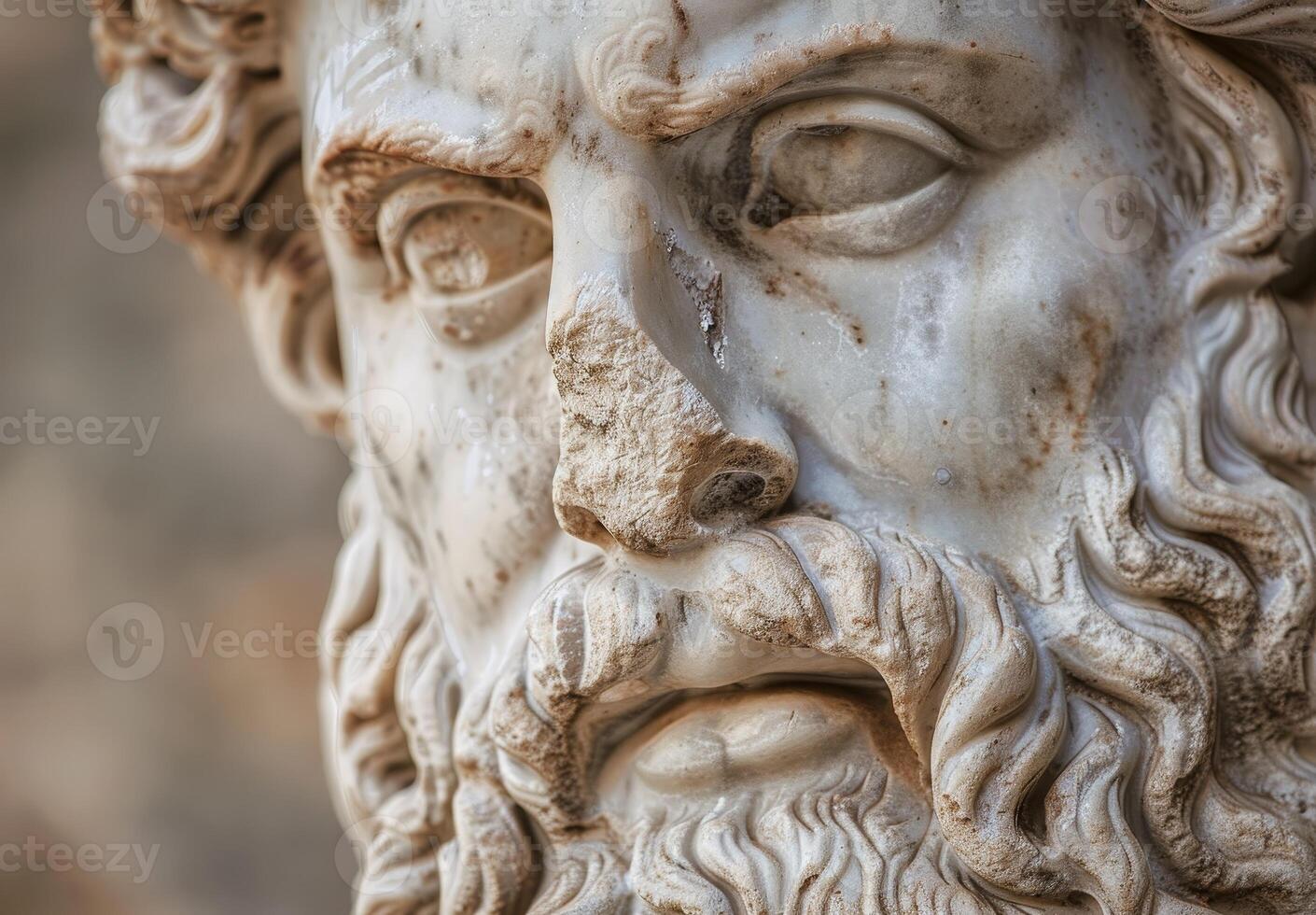 Close up of an Ancient Sculpted Face with Intricate Details photo