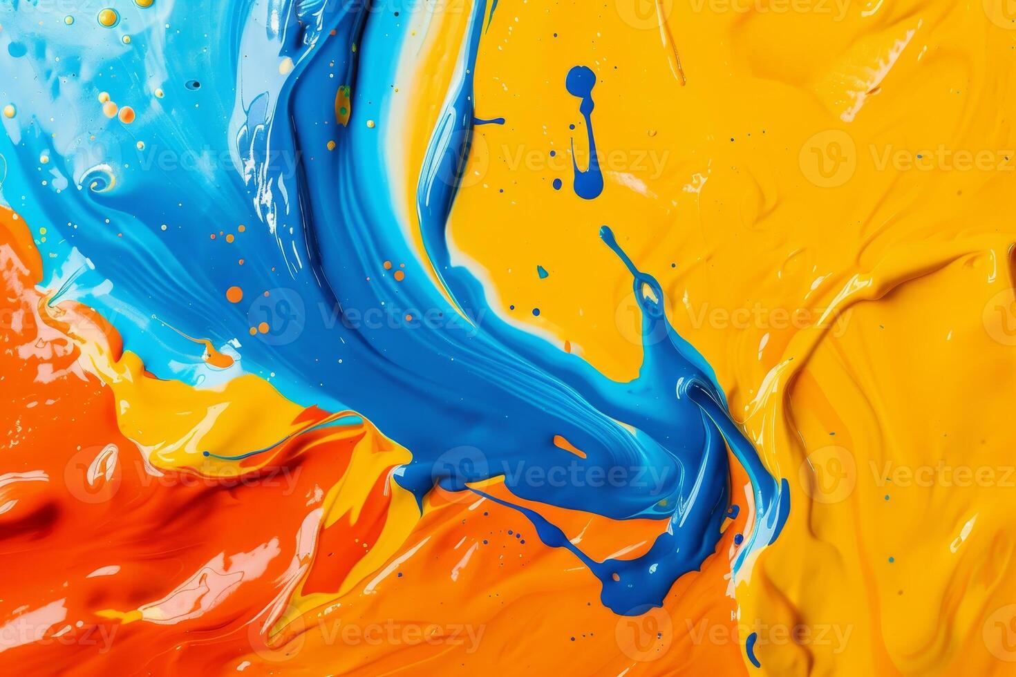 Vibrant swirl of blue and orange paint photo