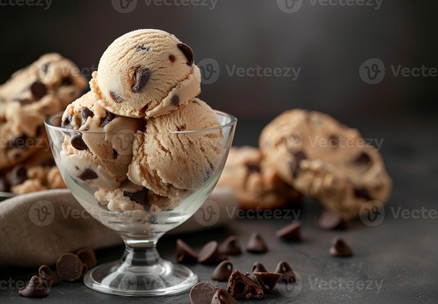 Delicious chocolate chip cookie dough ice cream served in a glass bowl photo