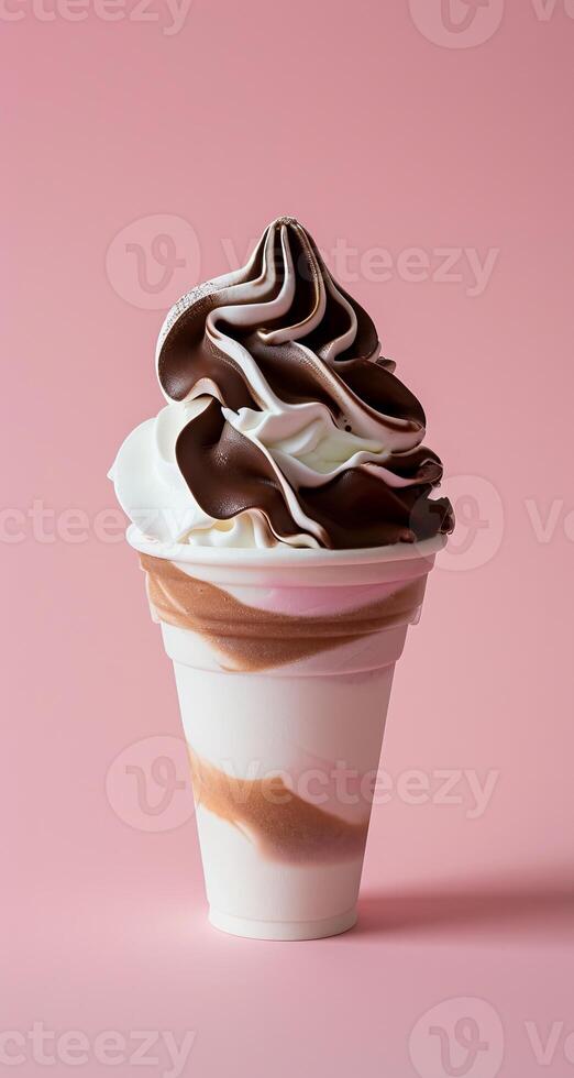 Swirls of Chocolate and Vanilla Soft Serve Ice Cream in a Cup photo