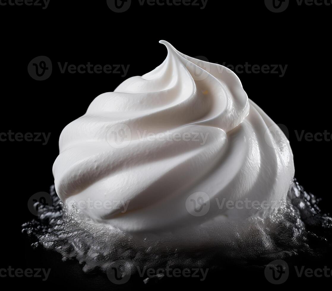 Perfect swirl of whipped cream on a dark background photo