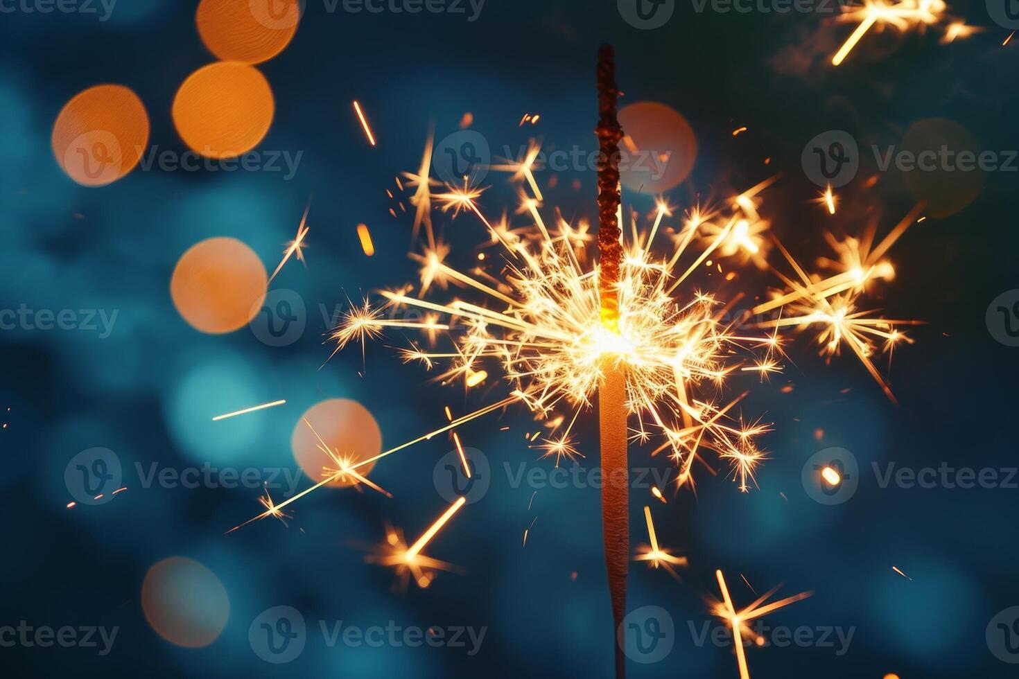 Sparkling celebration sparkler against a bokeh light background photo