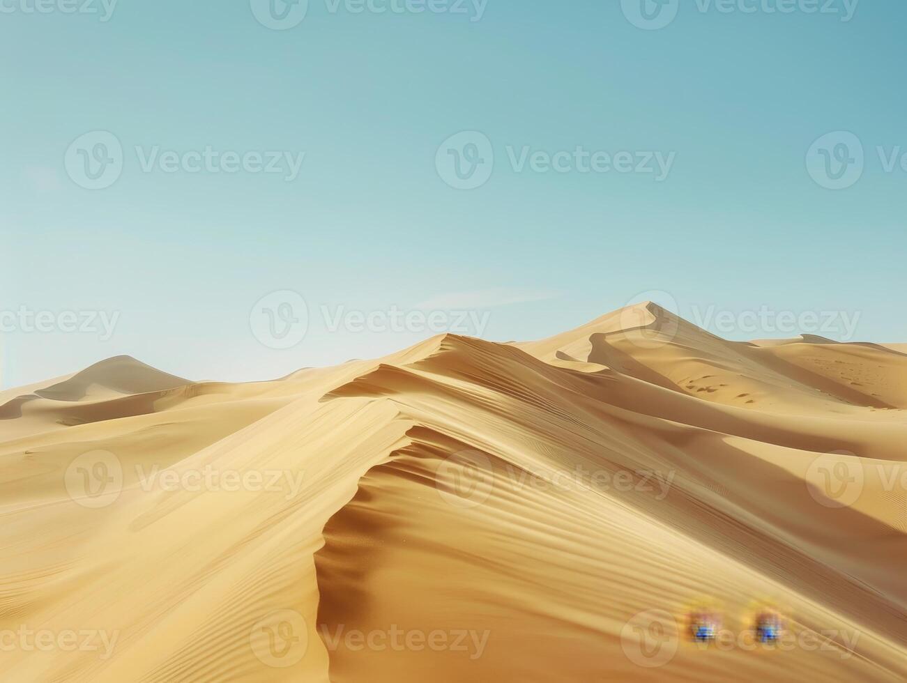Vast desert landscape under clear blue sky photo