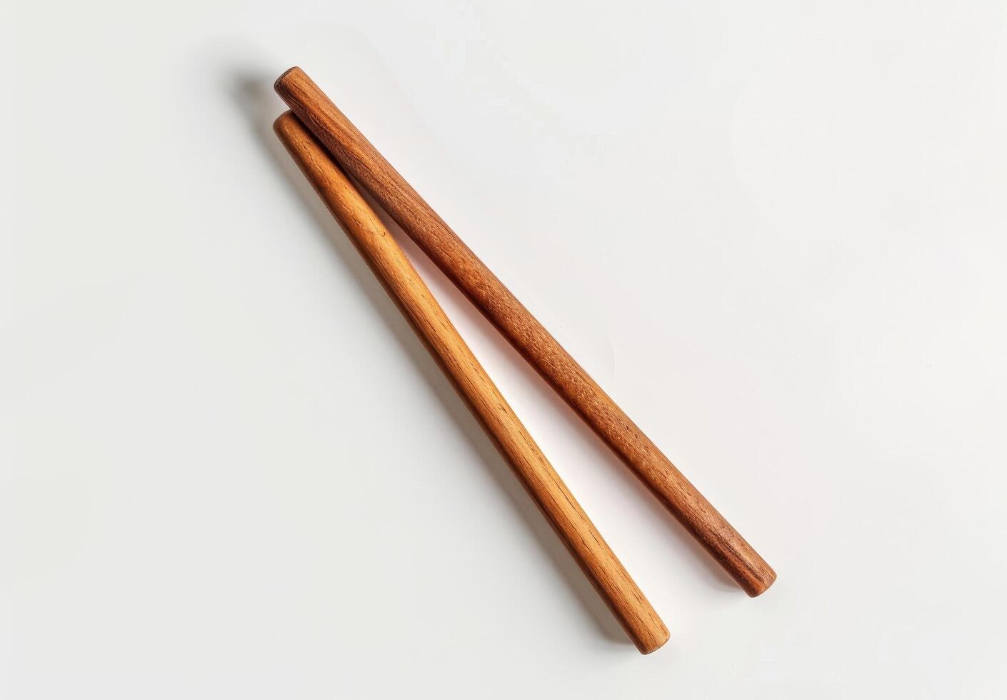 Wooden chopsticks on a white background photo