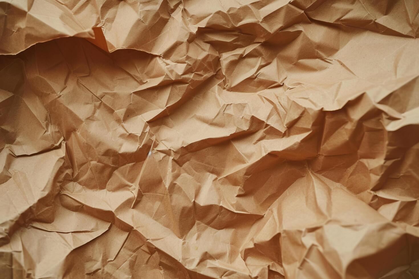 Close up of crumpled brown paper texture photo