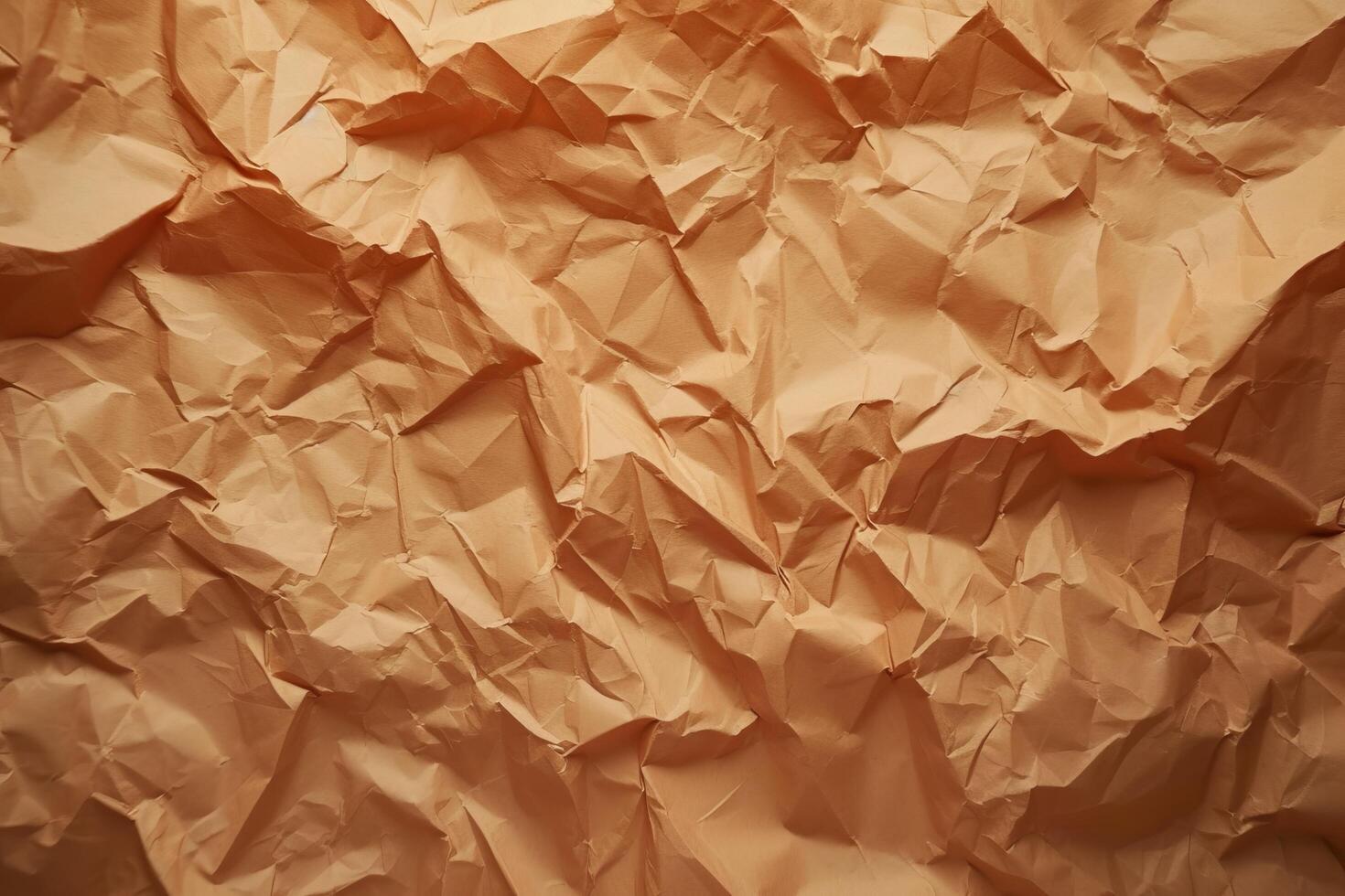 Textured crumpled brown paper background photo
