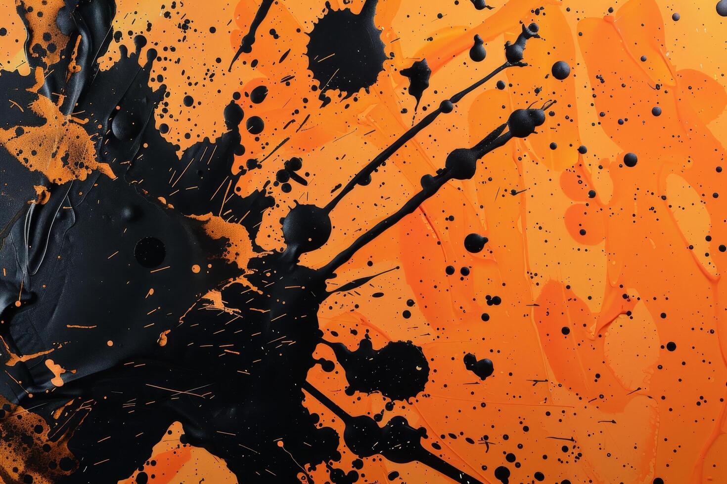 Abstract orange and black paint splatter background photo