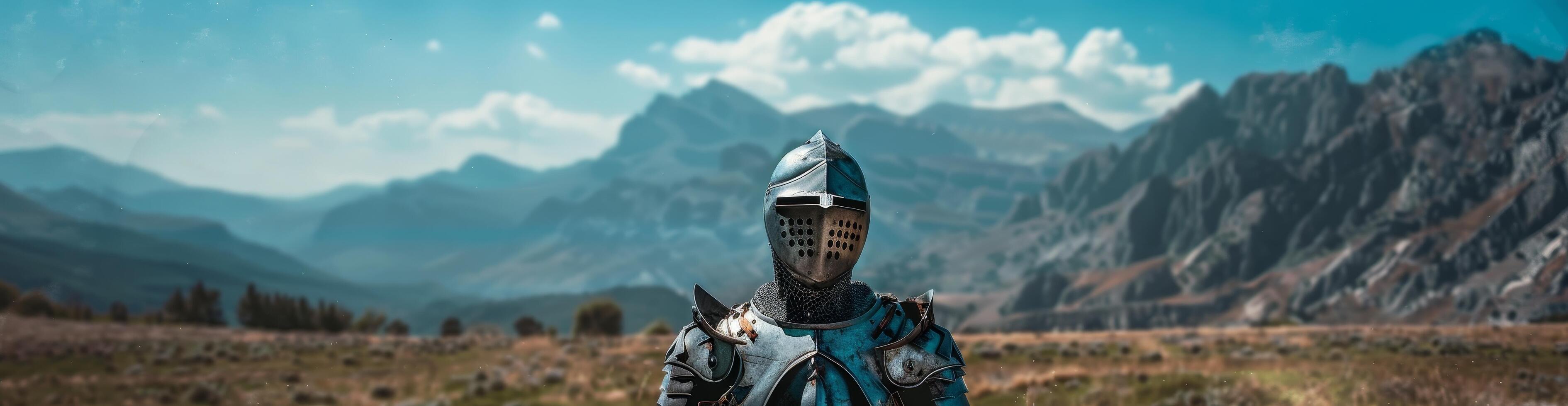 Medieval knight in armor standing in front of mountain landscape photo