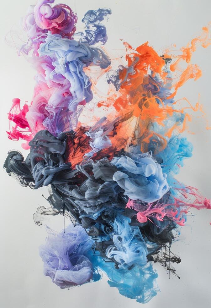 Colorful ink swirls in water photo