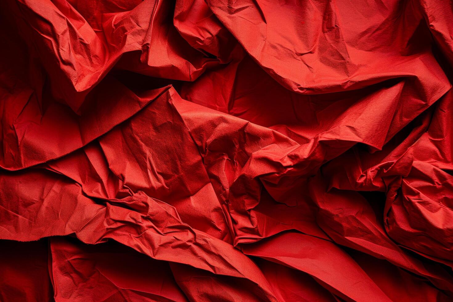 Abstract red crumpled paper texture background photo