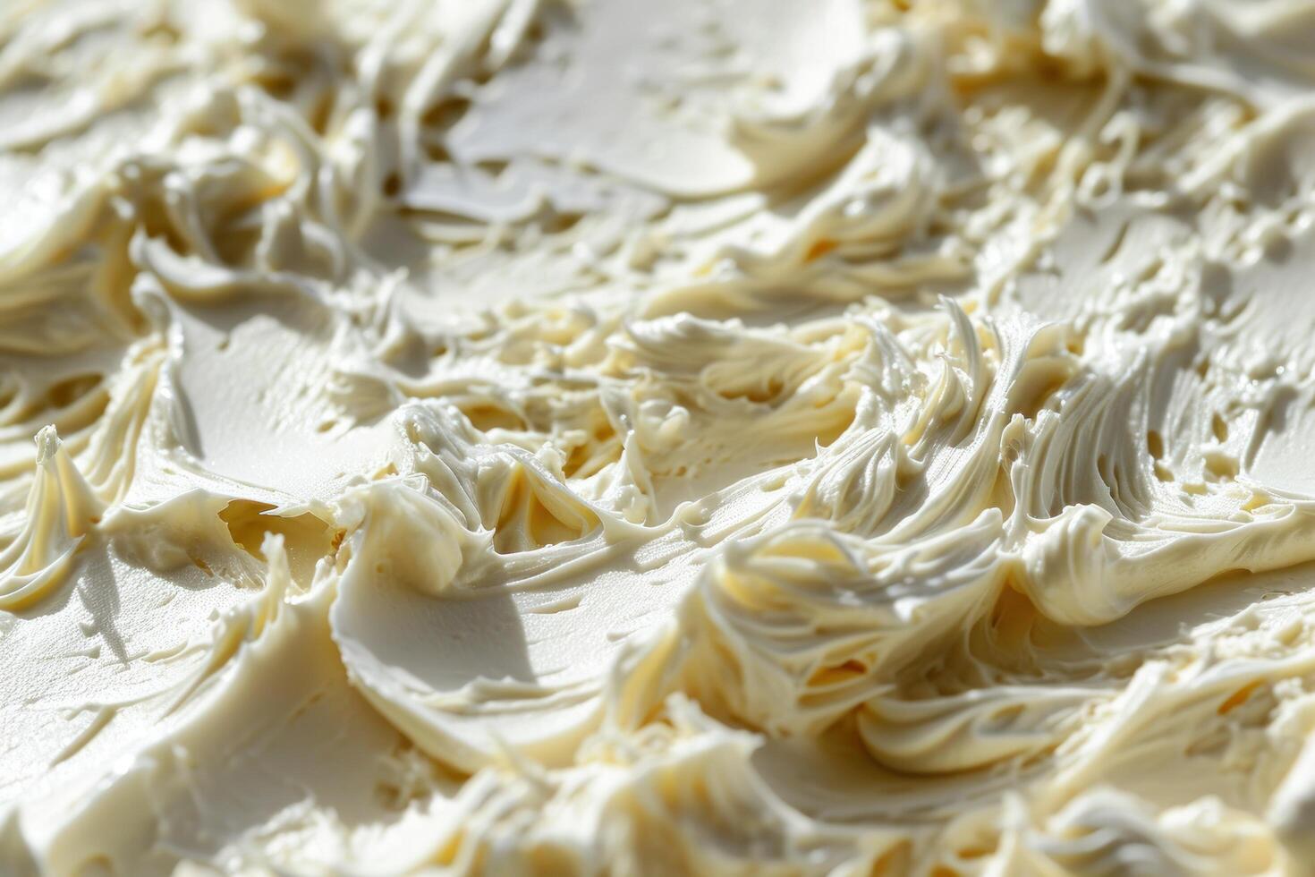 a close up of white frosting photo