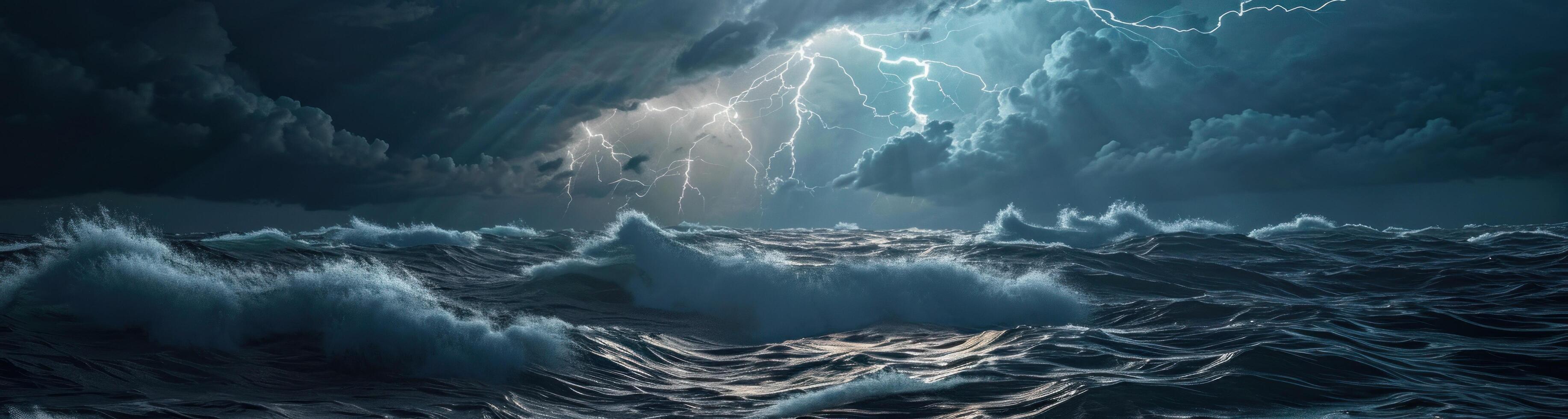 lightning striking over a stormy sea photo