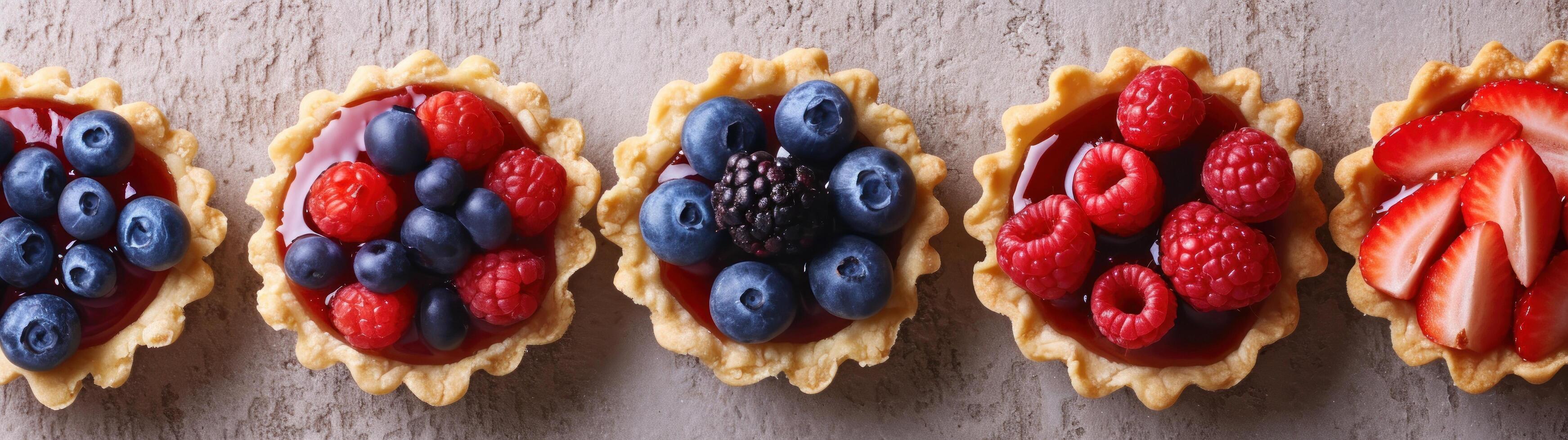 a group of fruit tarts photo