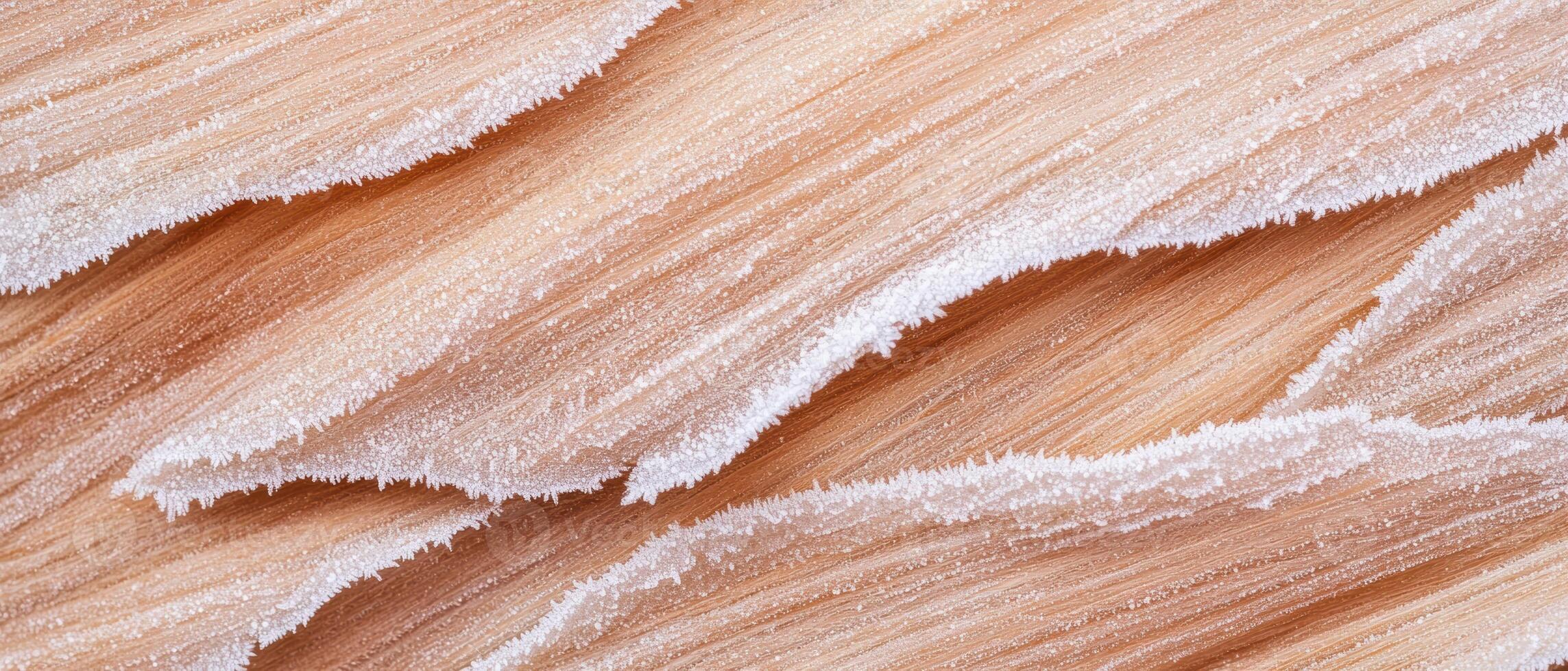 Closeup of a wooden surface with frost patterns photo