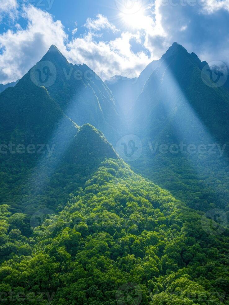Lush green mountains and clouds in the sky photo