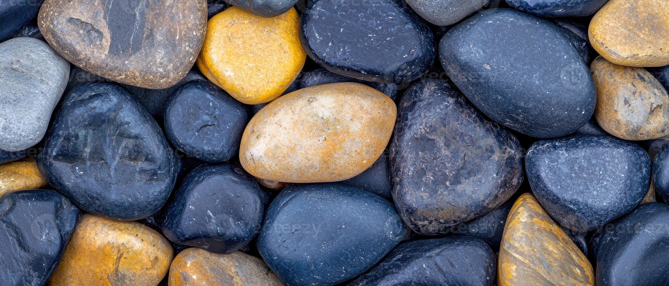 Assorted river rocks and pebbles photo