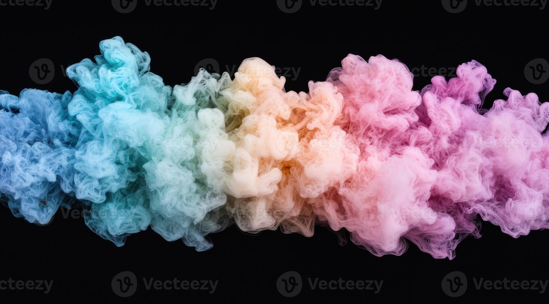 Colorful smoke explosion on black background photo