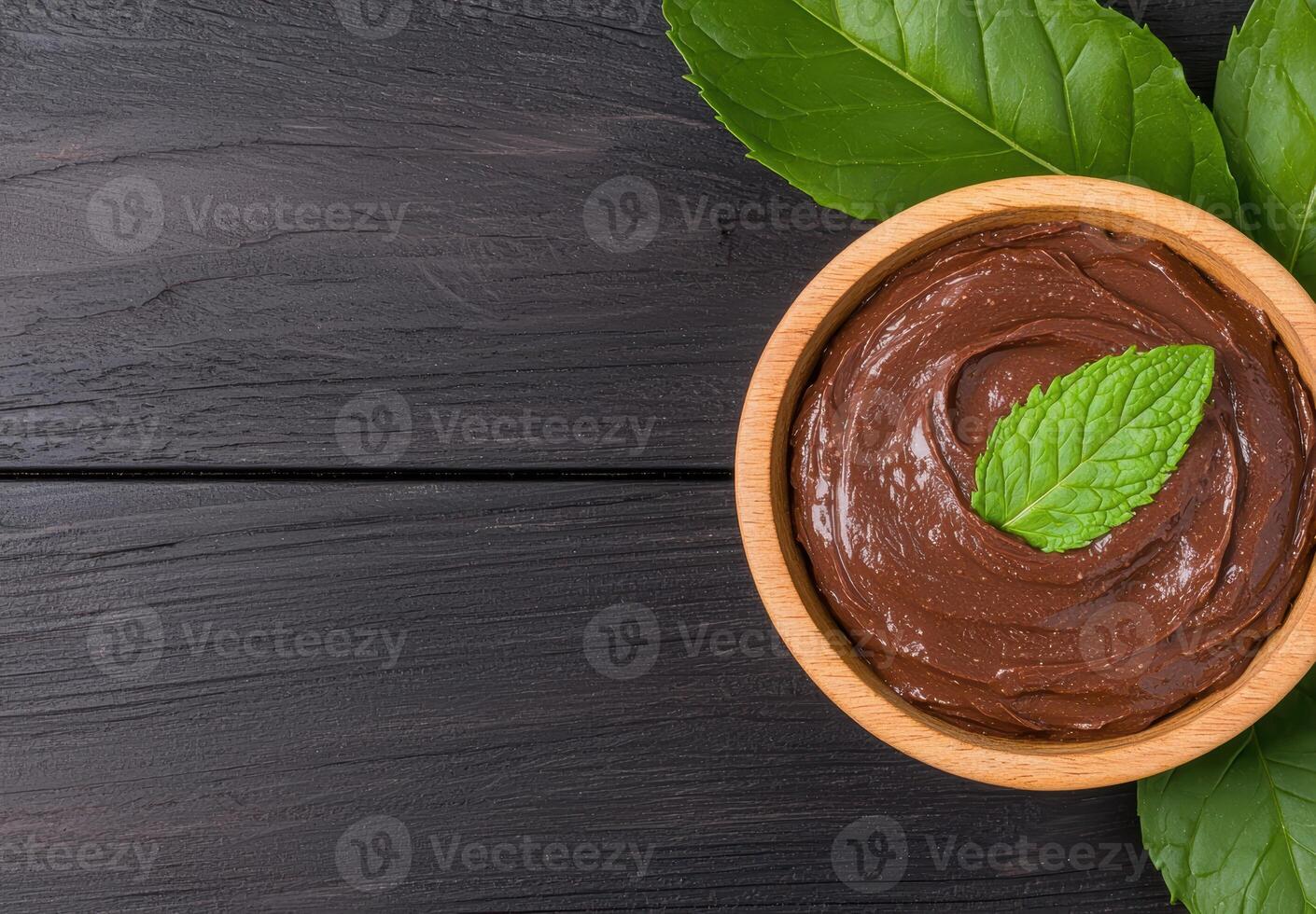 Chocolate mousse dessert with fresh mint leaves photo