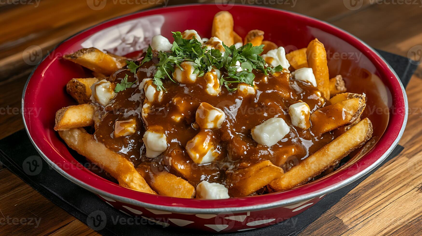 poutine with fresh cheese curds and hot gravy photo