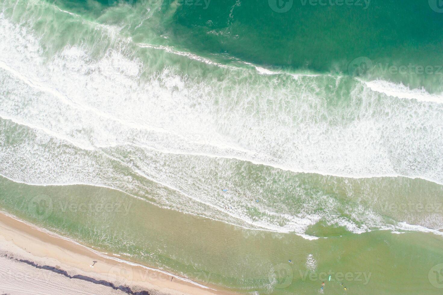 top-down view of beach with vibrant turquoise water, concept of Drone view tranquility photo