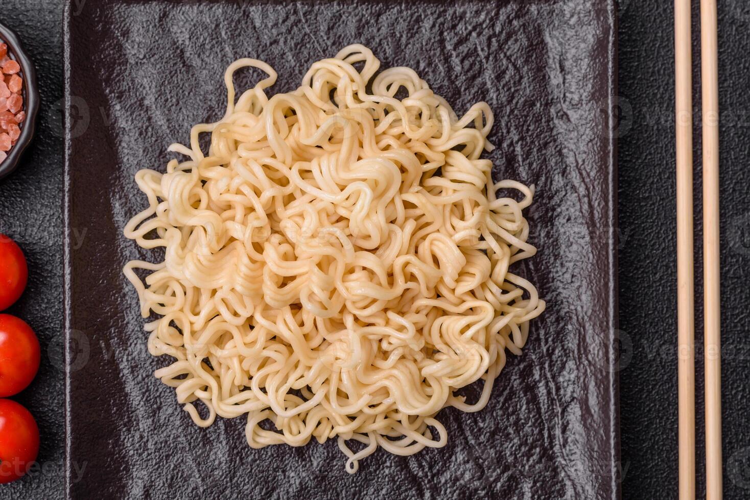 Rice noodles, asian food with soy sauce and spices photo