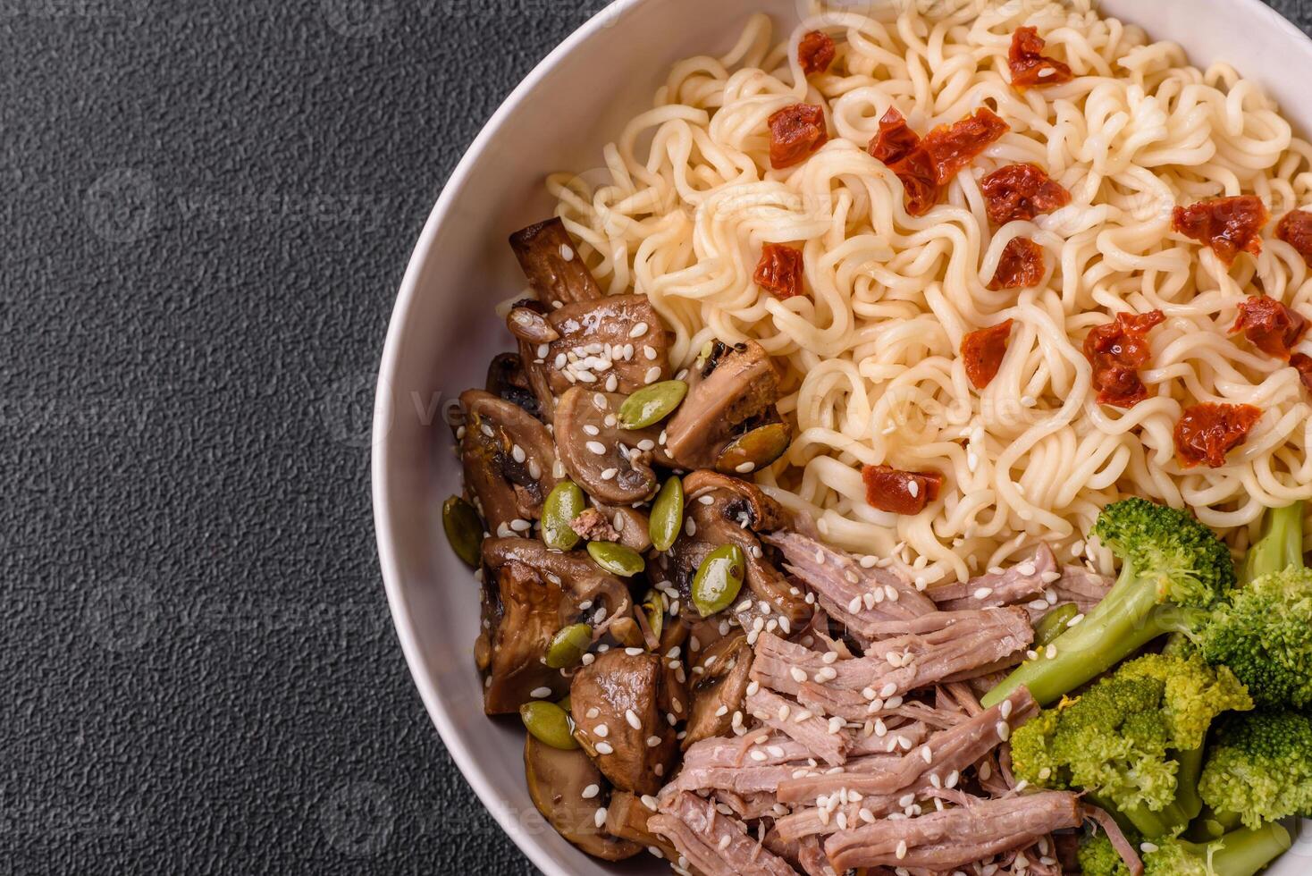 Rice noodles, asian food with soy sauce and spices photo