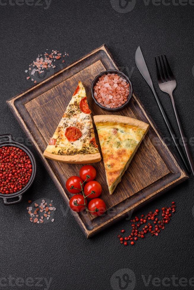 Delicious quiche with broccoli, cheese, chicken, spices and herbs photo