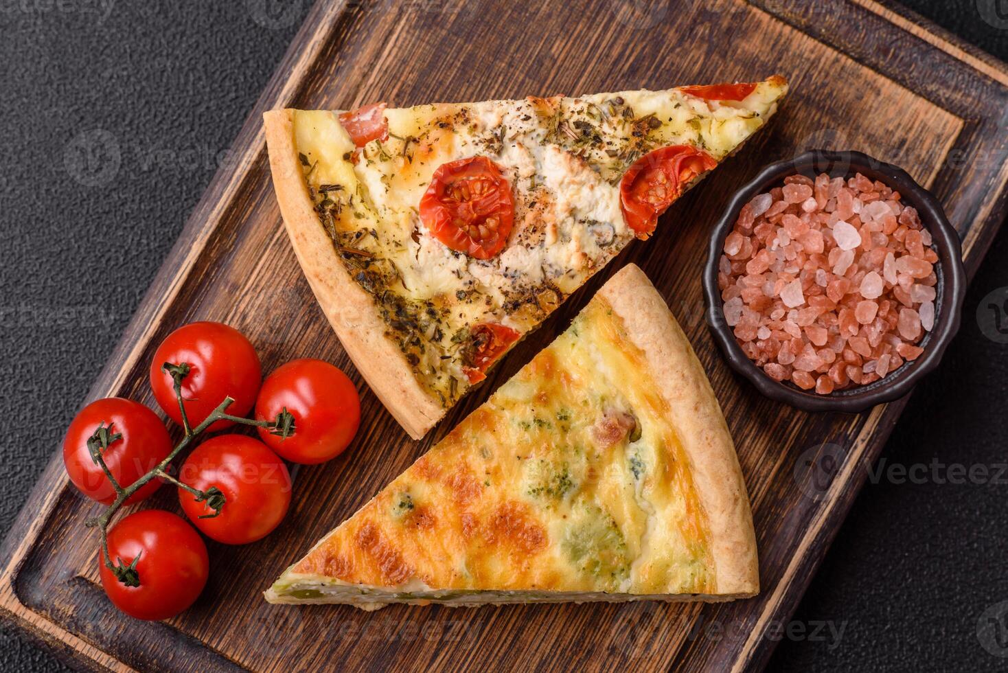 Delicious quiche with broccoli, cheese, chicken, spices and herbs photo