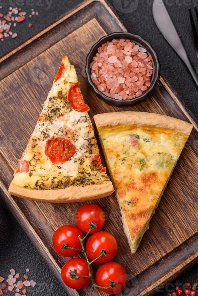 Delicious quiche with broccoli, cheese, chicken, spices and herbs photo