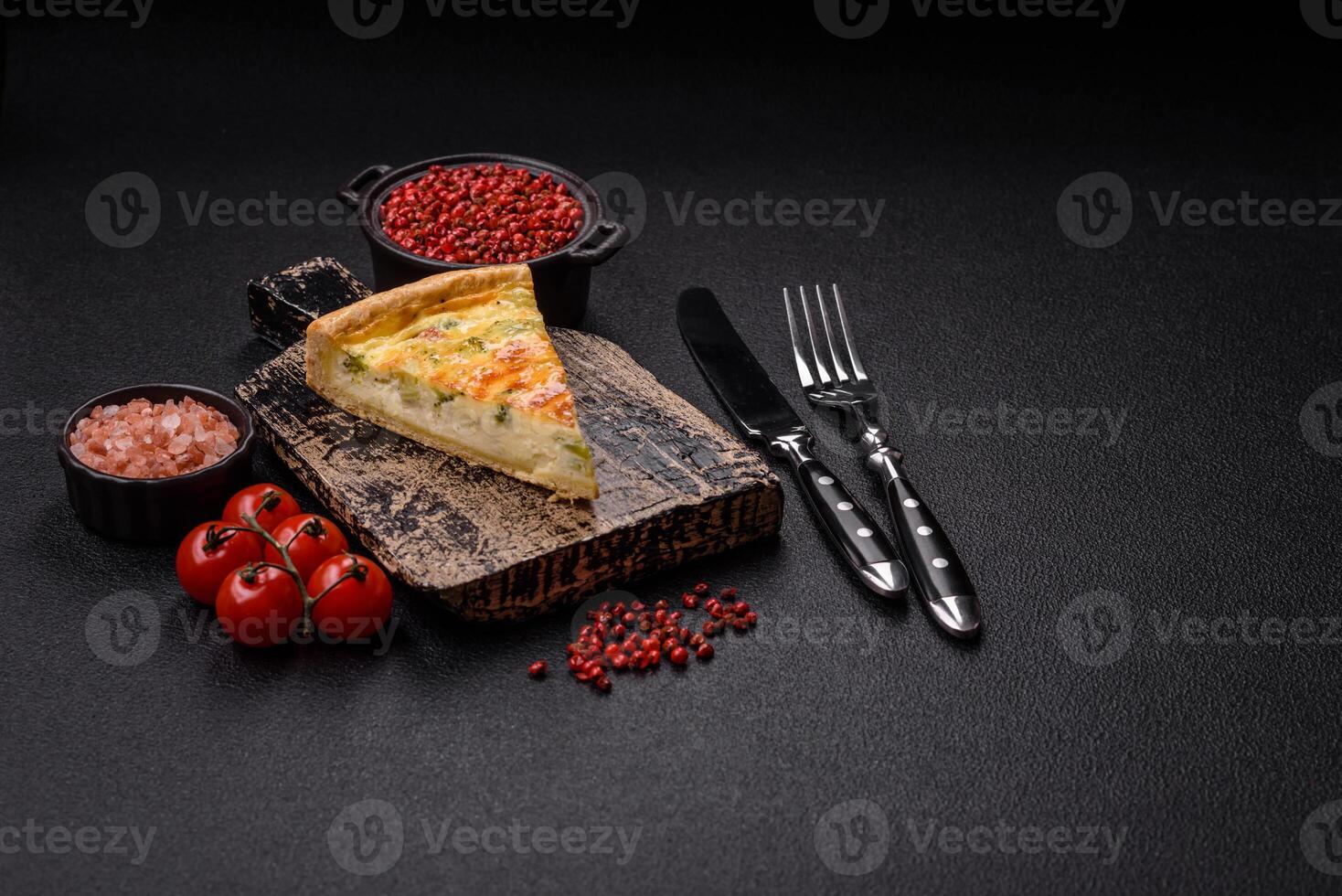Delicious quiche with broccoli, cheese, chicken, spices and herbs photo
